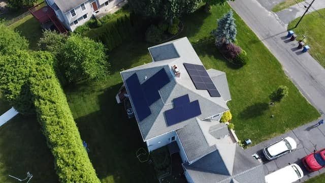 10.5 kW solar panel array on residential roof in Farmington, Connecticut by SunPol Solar