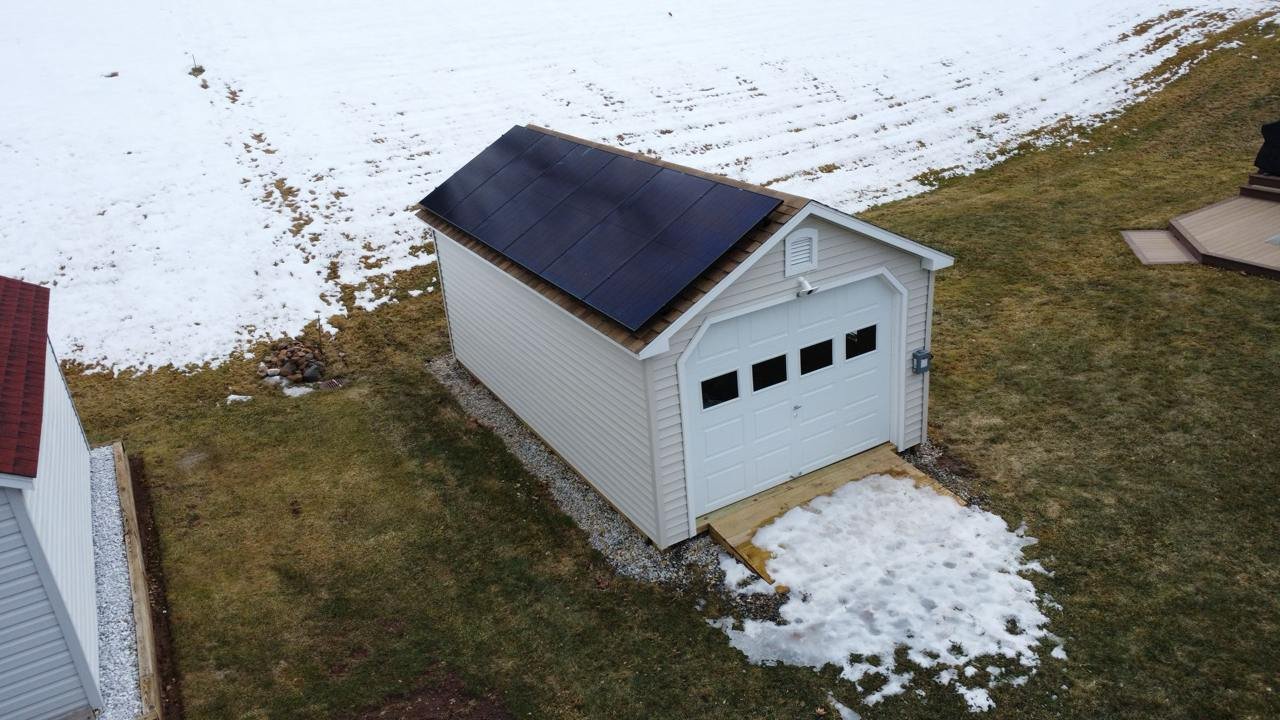 Solar panels on garage in winter — Connecticut